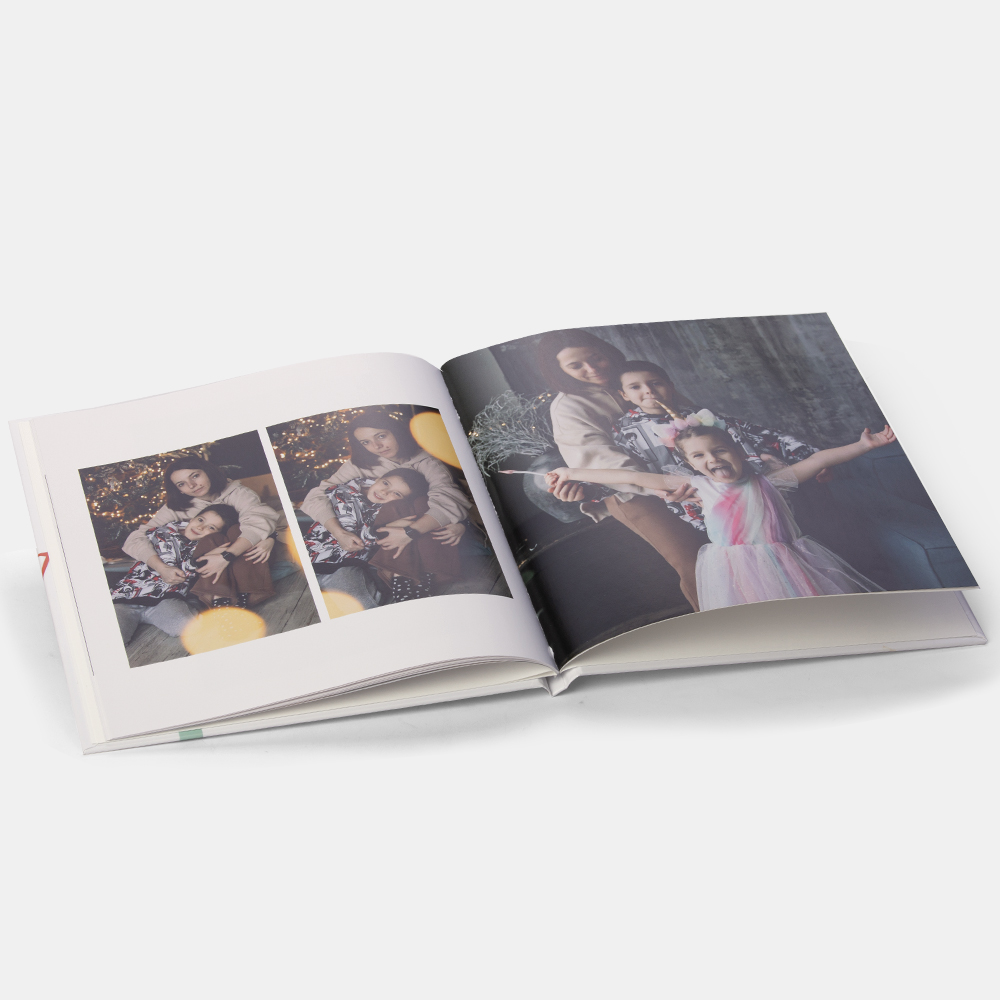 Новогодняя фотокнига Happy в твердой фотообложке Новогодняя фотокнига Happy в твердой фотообложке