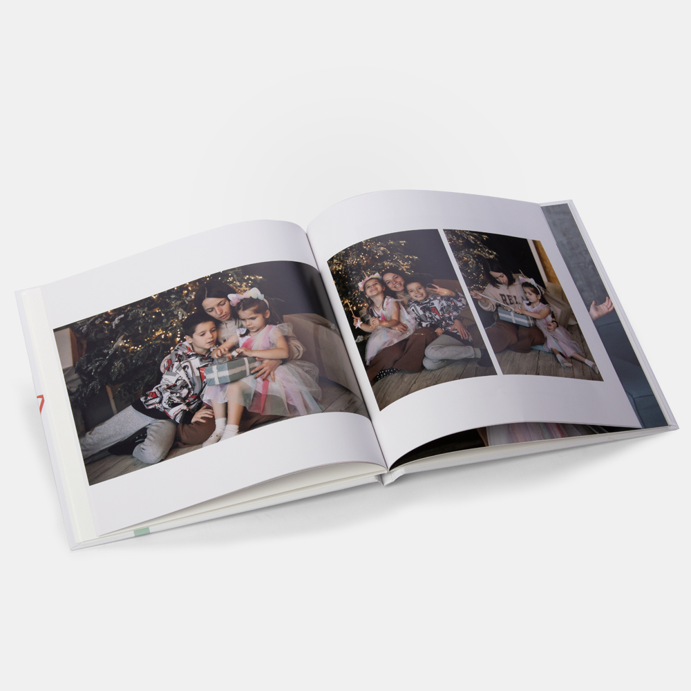 Новогодняя фотокнига Happy в твердой фотообложке Новогодняя фотокнига Happy в твердой фотообложке